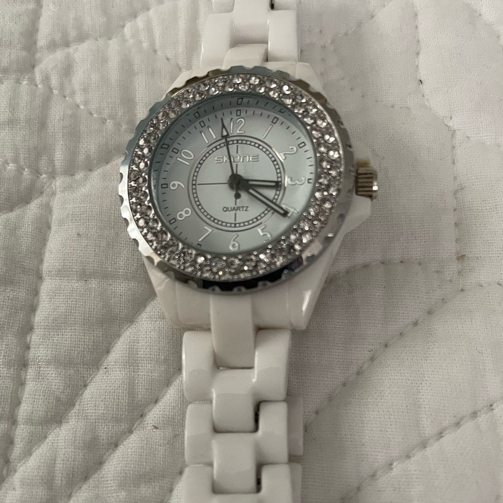 White link bracelet watch by Skone